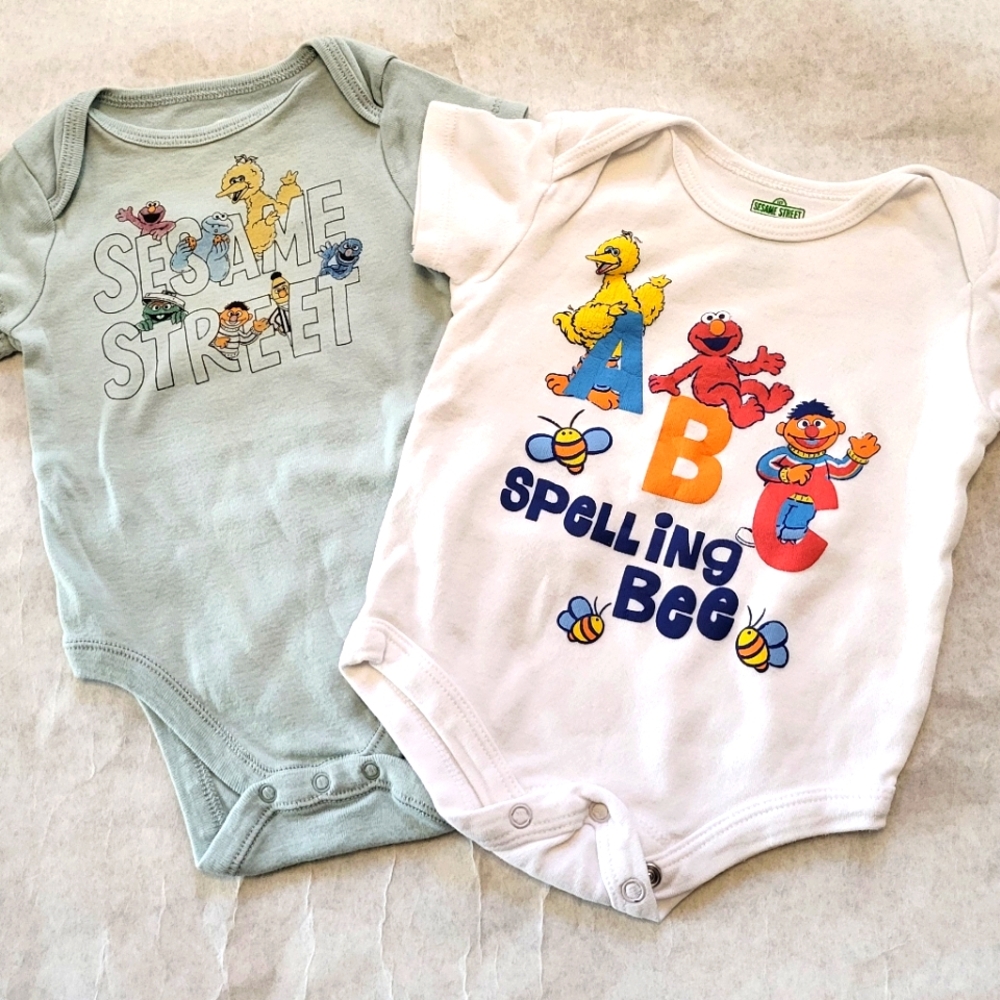Two Sesame Street onesies/bodysuits